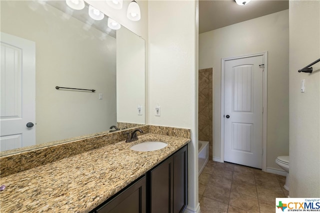 full bathroom featuring tile patterned flooring, shower / bath combination, vanity, and toilet