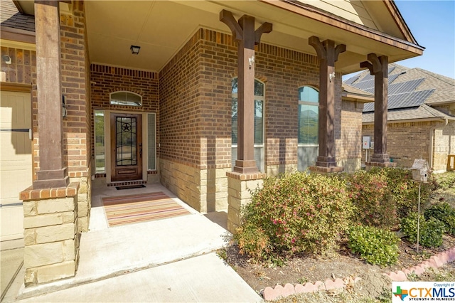 property entrance with a porch