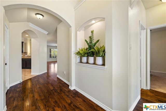 hallway featuring dark hardwood / wood-style floors