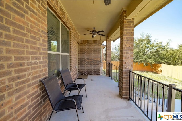 view of patio featuring ceiling fan