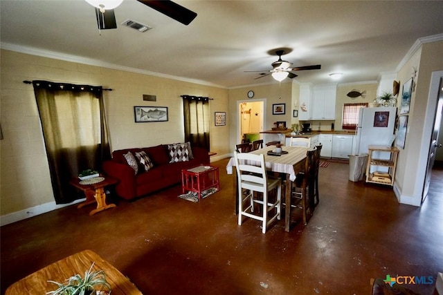 dining area with visible vents, ornamental molding, finished concrete flooring, baseboards, and ceiling fan