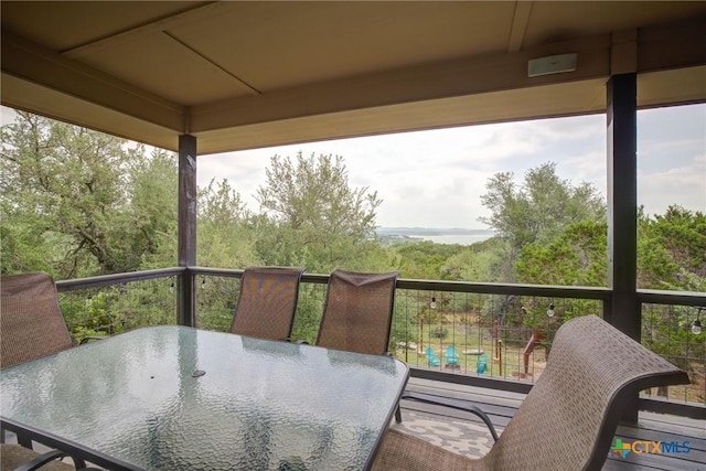 balcony featuring outdoor dining space