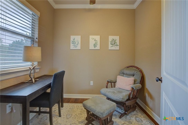 office area with baseboards, ornamental molding, and wood finished floors