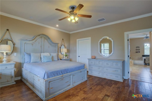 bedroom featuring visible vents, dark wood-style floors, and ornamental molding