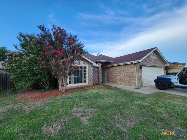 2006 Indian Camp Trl, Copperas Cove, TX 76522 - ranch-style home with brick siding and a garage