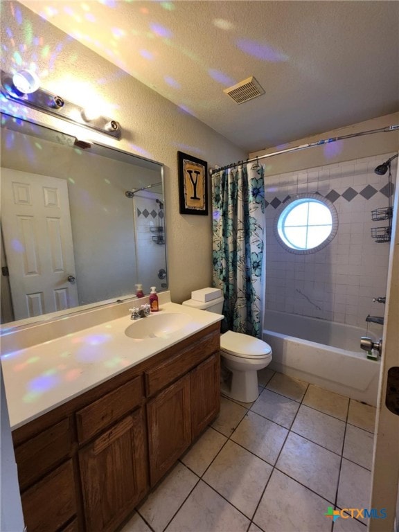 2006 Indian Camp Trl, Copperas Cove, TX 76522 - bathroom with shower / bath combination with curtain, vanity, tile patterned floors, and a textured ceiling