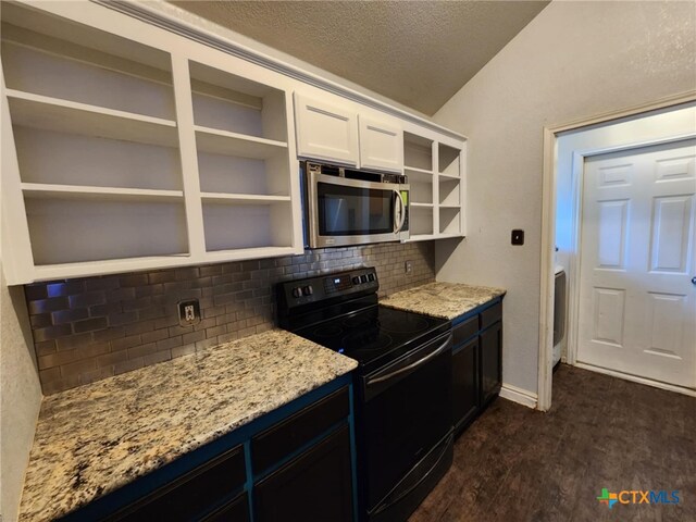 2006 Indian Camp Trl, Copperas Cove, TX 76522 - kitchen with stainless steel microwave, black / electric stove, open shelves, tasteful backsplash, and lofted ceiling