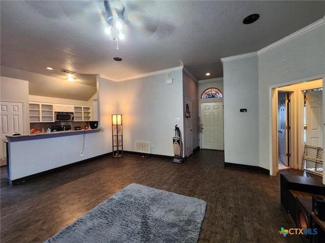 2006 Indian Camp Trl, Copperas Cove, TX 76522 - living room with ceiling fan, crown molding, wood finished floors, and recessed lighting