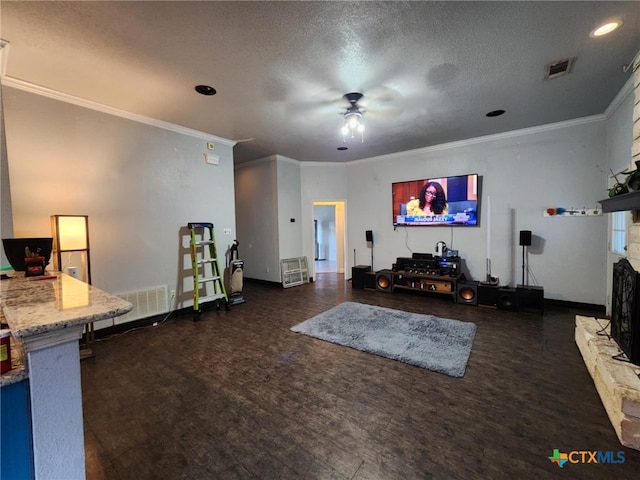 2006 Indian Camp Trl, Copperas Cove, TX 76522 - living area featuring wood finished floors, ceiling fan, crown molding, recessed lighting, and a fireplace with raised hearth