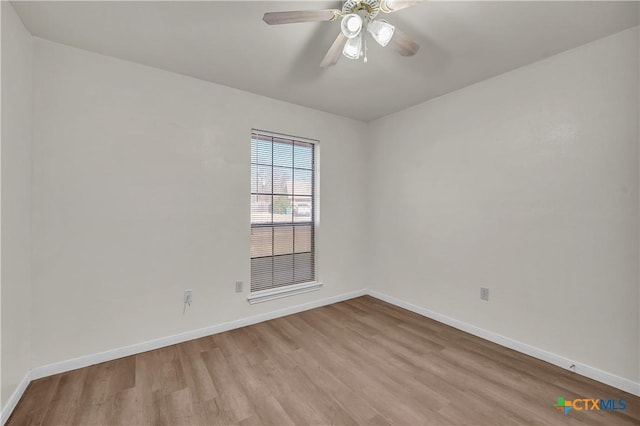 unfurnished room with ceiling fan and light hardwood / wood-style flooring