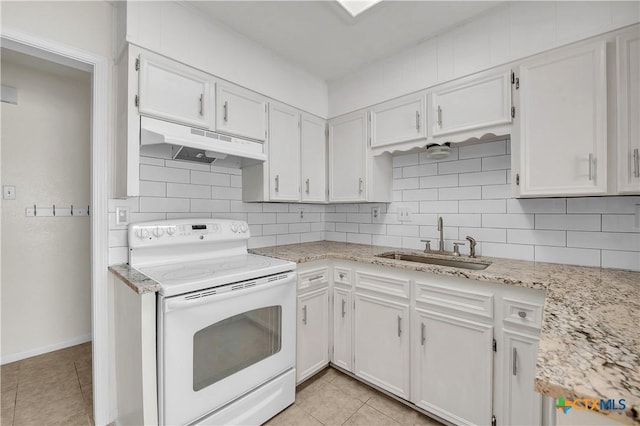 kitchen featuring white electric range, white cabinetry, and sink