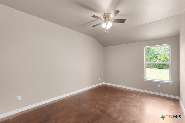 spare room with lofted ceiling and ceiling fan