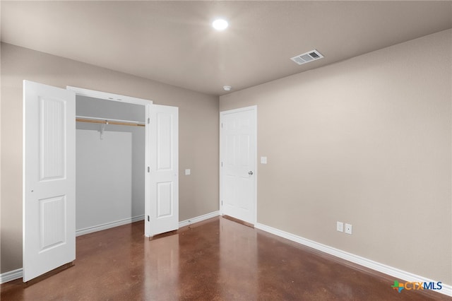 unfurnished bedroom with a closet