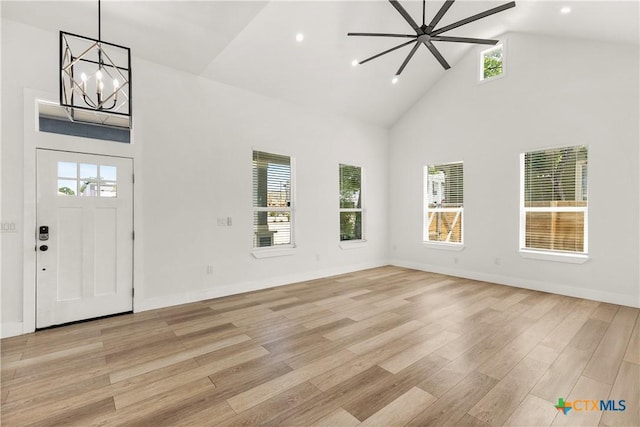 324 Idaho St, San Antonio, TX 78203 - entryway with high vaulted ceiling, a chandelier, light wood-style floors, recessed lighting, and baseboards