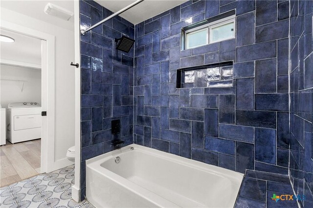 324 Idaho St, San Antonio, TX 78203 - full bath with toilet, bathtub / shower combination, tile patterned flooring, and baseboards