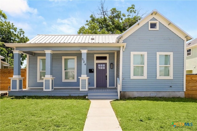 324 Idaho St, San Antonio, TX 78203 - bungalow-style home with covered porch and metal roof