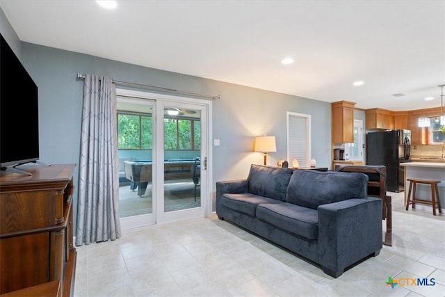 13242 Estate Trl, Belton, TX 76513 - living area with plenty of natural light, recessed lighting, and light tile patterned flooring