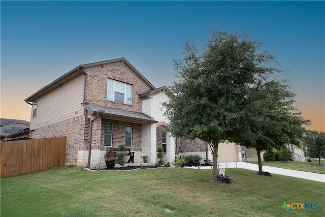 view of front of house featuring a yard