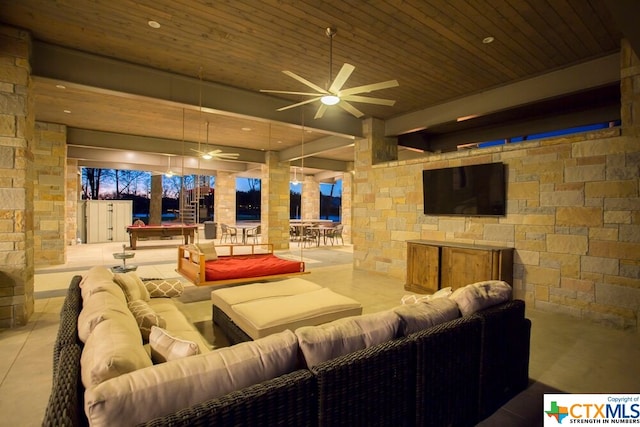 living room with ceiling fan and wood ceiling