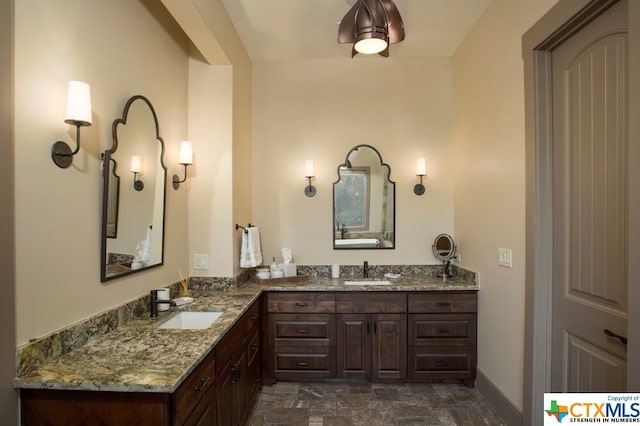 164 Cypress Way, Mcqueeney, TX 78123 - bathroom featuring stone finish flooring and vanity