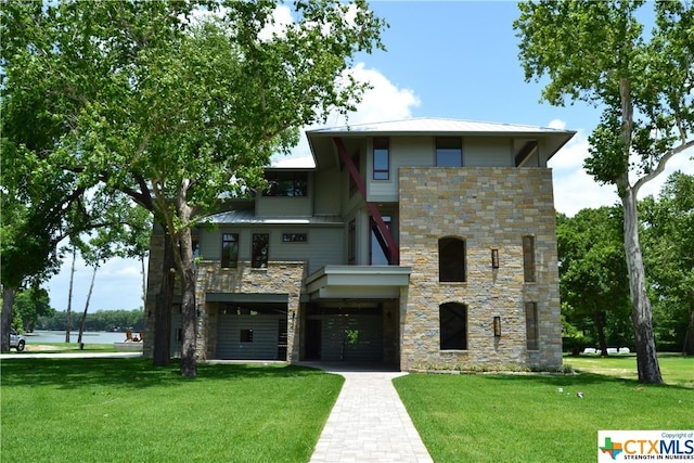 164 Cypress Way, Mcqueeney, TX 78123 - view of front of property featuring stone siding and a front lawn