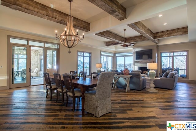 164 Cypress Way, Mcqueeney, TX 78123 - dining room with beamed ceiling, dark wood finished floors, healthy amount of natural light, a chandelier, and recessed lighting