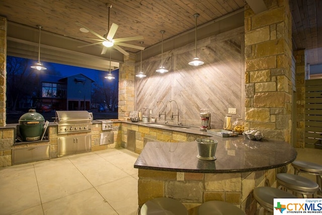 bar with ceiling fan, wood ceiling, sink, and decorative light fixtures