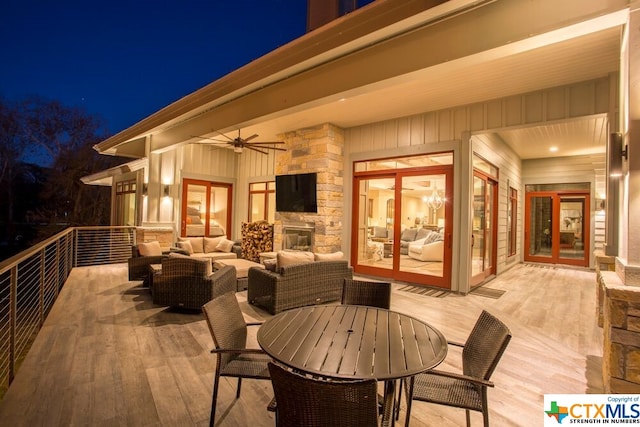 164 Cypress Way, Mcqueeney, TX 78123 - deck featuring outdoor lounge area, a ceiling fan, and french doors