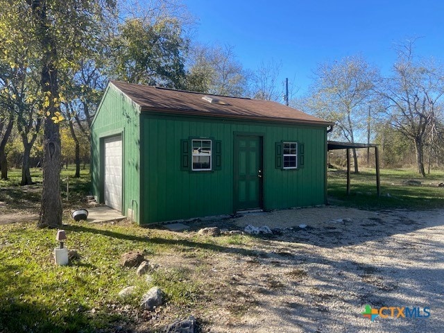 view of outdoor structure featuring a garage