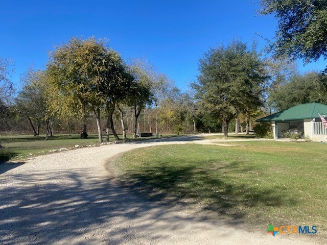 exterior space with a yard