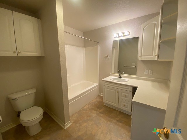 full bathroom with toilet, vanity, and shower / bathing tub combination