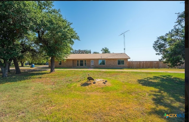 exterior space with a front yard