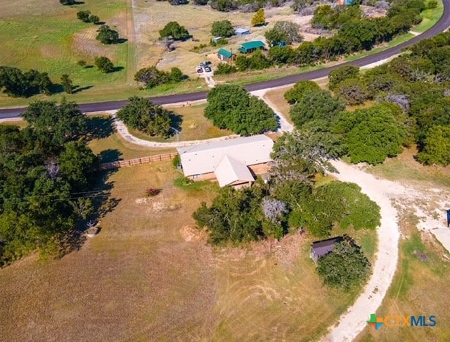 birds eye view of property featuring a rural view