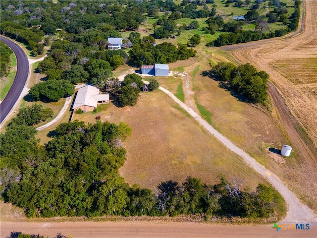 birds eye view of property featuring a rural view