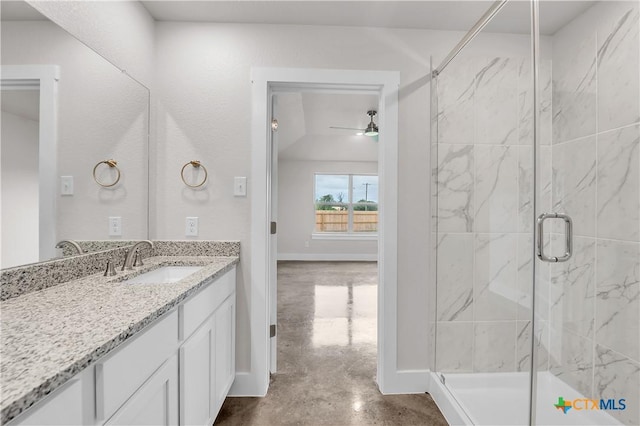 bathroom with baseboards, concrete flooring, a shower stall, ceiling fan, and vanity