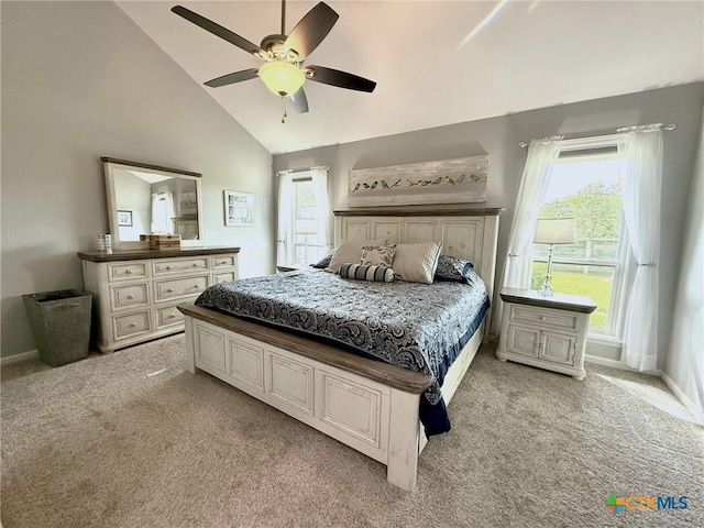 107 Savannah Dr, Victoria, TX 77904 - bedroom with light colored carpet, high vaulted ceiling, and ceiling fan