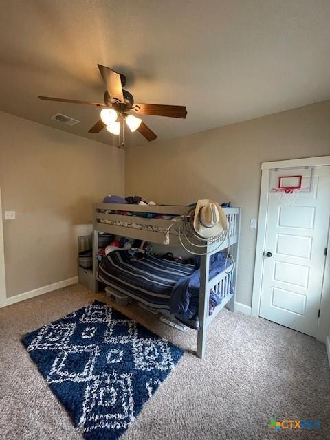 5618 County Road 3300, Kempner, TX 76539 - bedroom with carpet, baseboards, and a ceiling fan