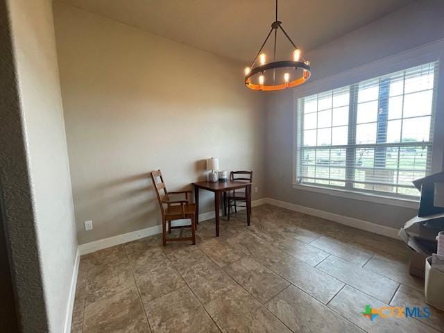 5618 County Road 3300, Kempner, TX 76539 - living area featuring a chandelier and baseboards