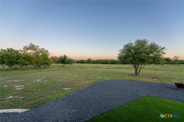 7817 W Fm 487, Florence, TX 76527 - yard at dusk featuring a rural view