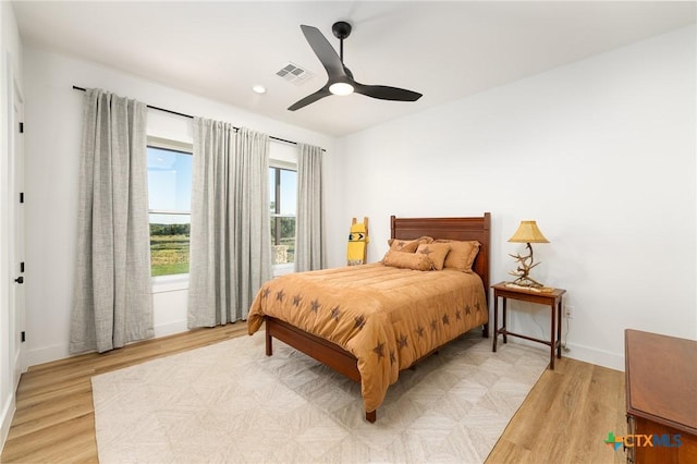 7817 W Fm 487, Florence, TX 76527 - bedroom featuring recessed lighting, baseboards, a ceiling fan, and light wood-style floors