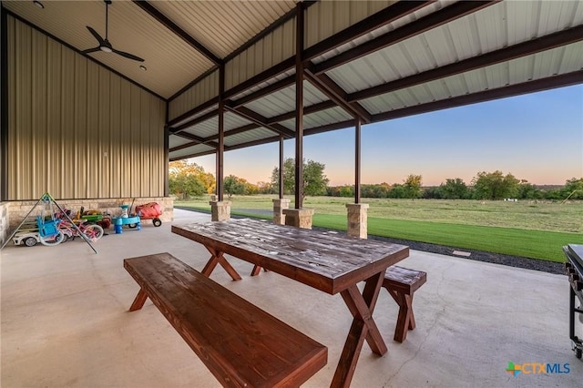 7817 W Fm 487, Florence, TX 76527 - patio terrace at dusk with a yard and a ceiling fan