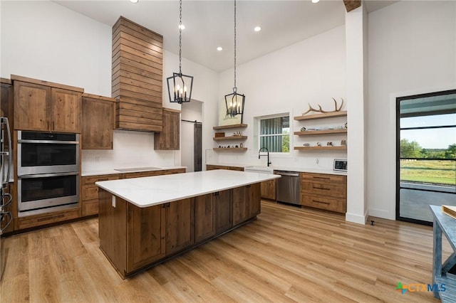 7817 W Fm 487, Florence, TX 76527 - kitchen with open shelves, high vaulted ceiling, a kitchen island, light countertops, and appliances with stainless steel finishes