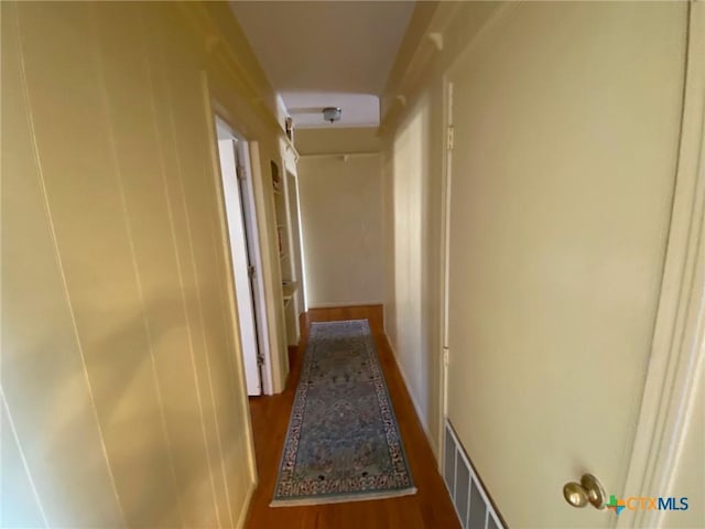 corridor featuring hardwood / wood-style floors