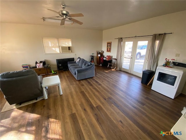 living room featuring ceiling fan, french doors, dark hardwood / wood-style floors, washer / clothes dryer, and cooling unit