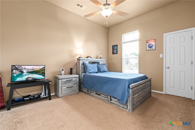 carpeted bedroom featuring ceiling fan