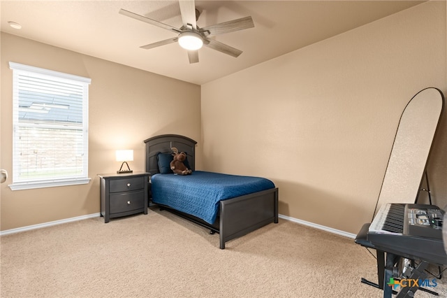 carpeted bedroom with ceiling fan