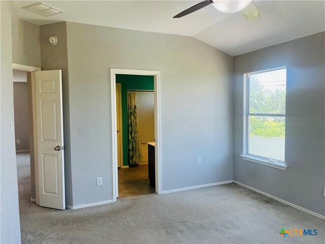5408 Donegal Bay Ct, Killeen, TX 76549 - unfurnished bedroom featuring vaulted ceiling, carpet, and ensuite bathroom