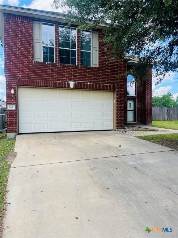 5408 Donegal Bay Ct, Killeen, TX 76549 - traditional-style house with brick siding, driveway, and a garage