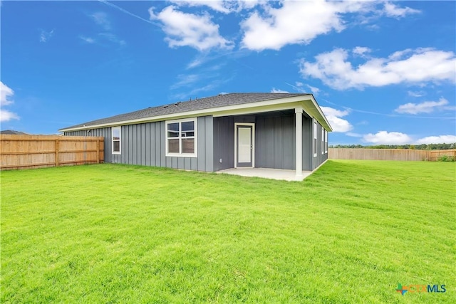 2402 Healy Dr, Temple, TX 76502 - rear view of property featuring board and batten siding and a patio