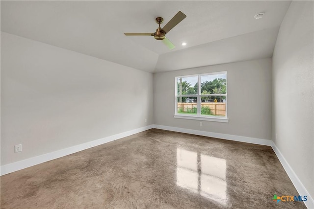 2402 Healy Dr, Temple, TX 76502 - empty room with ceiling fan, baseboards, vaulted ceiling, and concrete floors